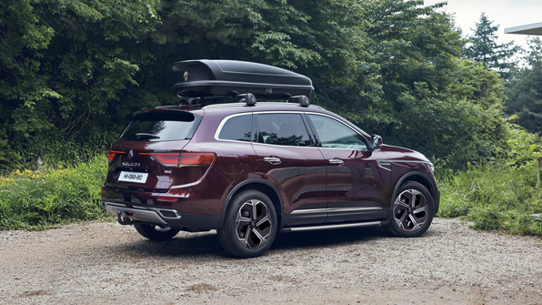 A roof box mounted on the New Renault KOLEOS is shown from a side view